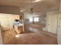 Spacious living room with vaulted ceilings and a ceiling fan at 5350 Rod Ct # 202, Las Vegas, NV 89122