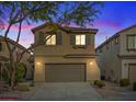 Charming two-story home with a two-car garage, desert landscaping, and neutral-toned stucco in a residential neighborhood at 6178 Pisan Ln, Las Vegas, NV 89148