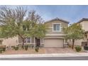 Inviting two-story home with a stone-accented facade, mature trees, and an attached two-car garage at 6403 Ava Ridge Ave, Las Vegas, NV 89141