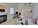 Light-filled living room features a fireplace and plenty of natural light at 6860 Coral Rock Dr, Las Vegas, NV 89108