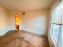 Bedroom featuring neutral walls, carpet, and a window with blinds at 8070 W Russell Rd # 2068, Las Vegas, NV 89113