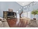 Spacious living room with hardwood floors and high ceilings at 9225 Evergreen Canyon Dr, Las Vegas, NV 89134