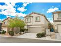 Two-story house with beige exterior, attached garage, and landscaping at 9757 Marcelline Ave, Las Vegas, NV 89148