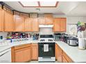 Well-equipped kitchen with ample cabinetry and appliances at 4655 Gold Dust Ave # 210, Las Vegas, NV 89120