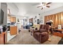 Living room features a cozy seating area and access to the kitchen at 4655 Gold Dust Ave # 210, Las Vegas, NV 89120