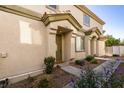 Inviting front entrance with landscaping and walkway at 6345 Dan Blocker Ave # 101, Henderson, NV 89011