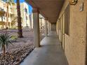 Condo building exterior showing walkway and entrance at 2060 Mesquite Ln # 104, Laughlin, NV 89029