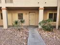 Condo building exterior showing walkway and entrance at 2060 Mesquite Ln # 104, Laughlin, NV 89029