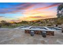 Luxury pool and spa with stone patio and mountain views at 22 Rue Grimaldi Way, Henderson, NV 89011