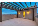 Spacious rooftop deck with pergola, city views, and outdoor lighting at 3346 Esker Ridge Ave, Henderson, NV 89044