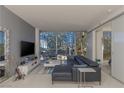 Modern living room with floor to ceiling windows and city views at 3726 Las Vegas Blvd # 705, Las Vegas, NV 89158