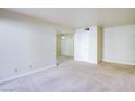 Bright living room with neutral walls and carpeting at 5060 Indian River Dr # 377, Las Vegas, NV 89103