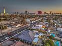 An aerial view showing the city skyline with residential neighborhoods in the foreground at 1202 S Rancho Dr, Las Vegas, NV 89102