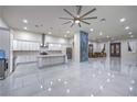 Spacious open kitchen featuring white cabinetry, stainless steel appliances, and a large island at 1202 S Rancho Dr, Las Vegas, NV 89102