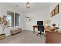 Bright home office with built-in shelving and large window at 2598 Iron Crest Ln, Las Vegas, NV 89138