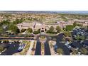 Aerial view of a community clubhouse with parking lot at 3025 Seaford Peak Dr, Henderson, NV 89052