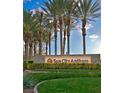 Sun City Anthem community entrance with palm trees and landscaping at 3025 Seaford Peak Dr, Henderson, NV 89052