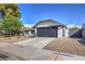 House exterior view, showcasing the front yard and street at 3425 Irv Marcus Dr, Las Vegas, NV 89108