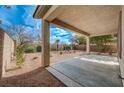 Covered patio overlooking a desert landscaped backyard at 6504 Birdcall St, North Las Vegas, NV 89084