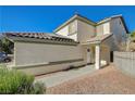 Two-story house with a walkway leading to the entrance at 6536 Elk Creek Ln, Las Vegas, NV 89156