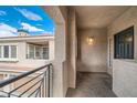 Private balcony overlooking the building and parking area at 10809 Garden Mist Dr # 2093, Las Vegas, NV 89135