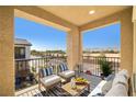 Private balcony features comfortable seating and scenic views at 7230 N Decatur Blvd # 6, Las Vegas, NV 89131