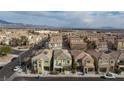Aerial view showcasing house and surrounding neighborhood at 7660 Fabled Filigree St, Las Vegas, NV 89149