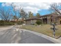 Single-story home with neutral exterior, attached garage, and landscaped yard at 3 Glendora Ct, Henderson, NV 89052