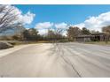 Residential street view showing a quiet cul-de-sac neighborhood at 3 Glendora Ct, Henderson, NV 89052