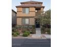 Two-story house with front yard landscaping and stairs at 3041 Savella Ave, Henderson, NV 89044