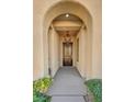 Elegant entryway with arched doorways and a chandelier at 37 Stonemark Dr, Henderson, NV 89052