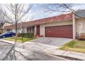 Single story home with attached garage and mature trees at 3767 Monument St, Las Vegas, NV 89121