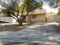 Front view of a house with a gated driveway at 384 Norlina Ct, Henderson, NV 89014