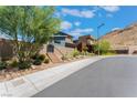 Modern home on a quiet street with mountain views in the background at 7230 Galaxy Dune St, Las Vegas, NV 89148