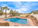 Inviting rectangular pool with a view of a golf course at 86 Myrtle Beach Dr, Henderson, NV 89074