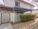 Front view of the property showcasing a covered patio and gate at 1008 Willow Tree Dr # B, Las Vegas, NV 89128