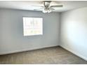 Spacious bedroom with neutral carpeting and large window at 3513 Golden Chariot Ave, Las Vegas, NV 89106