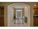 Elegant entryway with tile flooring and arched doorways at 3540 E Burgundy Dr, Pahrump, NV 89048