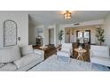 Spacious living room featuring comfortable seating and natural light at 3981 Ebro Way, Las Vegas, NV 89103