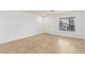 Bright living room with tile flooring and neutral walls at 531 Dairy Creek Ave, Las Vegas, NV 89183