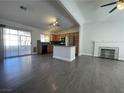 Bright kitchen with an island, stainless steel appliances, and wood cabinets at 6552 Boxwood Ln, Las Vegas, NV 89103