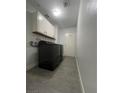 Laundry room with washer, dryer, and extra storage at 6552 Boxwood Ln, Las Vegas, NV 89103