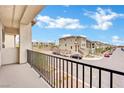 Private balcony overlooking community and street at 7883 Bethel Heights Ln, Las Vegas, NV 89113