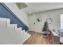 Bright entryway with modern staircase, neutral decor, and stylish accents at 3473 Monte Carlo Dr, Las Vegas, NV 89121
