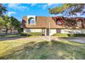 Inviting exterior featuring a well-maintained lawn and distinctive architectural details at 3473 Monte Carlo Dr, Las Vegas, NV 89121