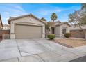 Beautiful single-story home featuring a two-car garage, wide driveway, and desert landscaping at 4546 Cliff Breeze Dr, North Las Vegas, NV 89081