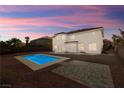 Private backyard with a sparkling pool and an outdoor patio area, perfect for entertaining at 6442 Bright Nimbus Ave, Las Vegas, NV 89139