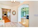 Elegant entryway with tiled flooring, offering views into the living room and beyond at 830 Park Ln, Henderson, NV 89015