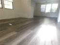 Spacious living room with hardwood floors and fireplace at 11173 Hickory Glen St, Las Vegas, NV 89179