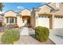 House exterior showcasing walkway and landscaping at 2138 Ponticello Dr, Henderson, NV 89052